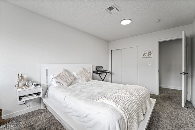 2507 Albemarle Way, Henderson, NV 89014 - bedroom with carpet flooring, baseboards, a textured ceiling, and a closet