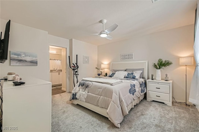 6835 Orange Horizon St, North Las Vegas, NV 89086 - bedroom featuring light carpet, ensuite bathroom, baseboards, and ceiling fan