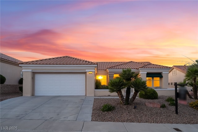 9812 Folsom Dr, Las Vegas, NV 89134 - mediterranean / spanish home with stucco siding, an attached garage, driveway, and a tile roof