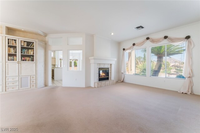 9812 Folsom Dr, Las Vegas, NV 89134 - unfurnished living room with carpet floors, a fireplace, and ornamental molding
