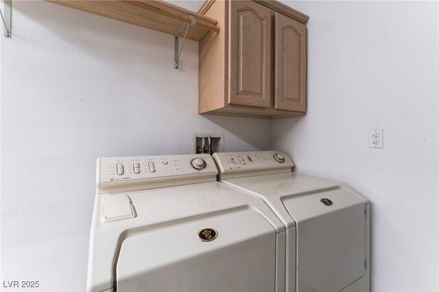 9812 Folsom Dr, Las Vegas, NV 89134 - laundry area with cabinet space and washing machine and clothes dryer