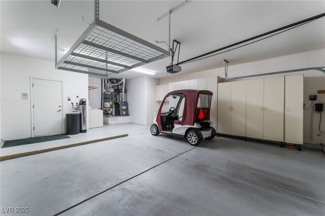 9812 Folsom Dr, Las Vegas, NV 89134 - garage with a garage door opener and heating unit