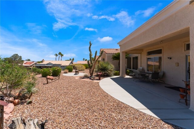 9812 Folsom Dr, Las Vegas, NV 89134 - view of yard featuring a patio