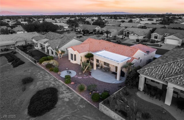 9812 Folsom Dr, Las Vegas, NV 89134 - aerial view at dusk of a residential view and a mountain view