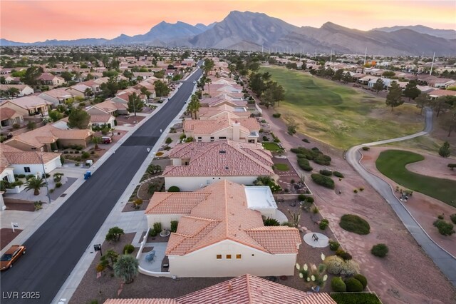9812 Folsom Dr, Las Vegas, NV 89134 - aerial perspective of suburban area featuring a mountain backdrop and a local golf course