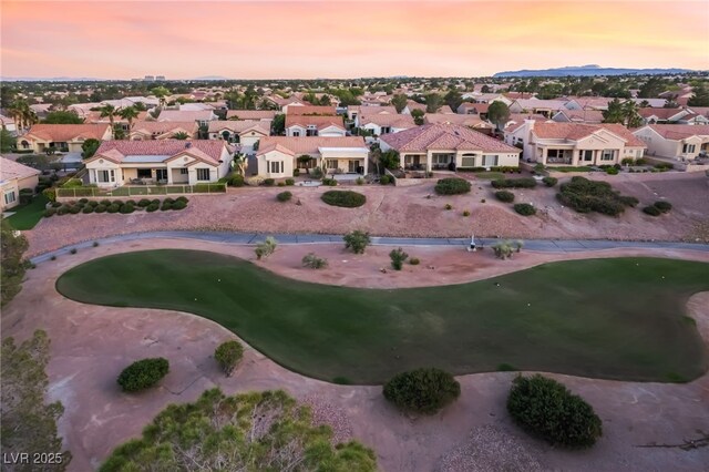 9812 Folsom Dr, Las Vegas, NV 89134 - aerial perspective of suburban area with a golf club and a mountainous background