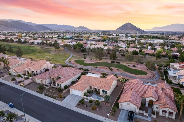 9812 Folsom Dr, Las Vegas, NV 89134 - aerial perspective of suburban area with a mountainous background and a local golf course