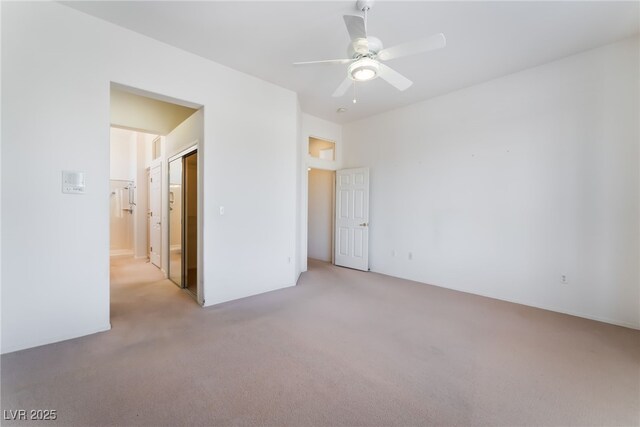 9812 Folsom Dr, Las Vegas, NV 89134 - unfurnished bedroom with light colored carpet and a ceiling fan