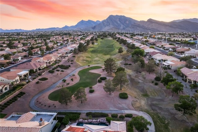 9812 Folsom Dr, Las Vegas, NV 89134 - aerial overview of property's location featuring a mountainous background, nearby suburban area, and a local golf course