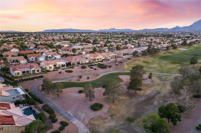 9812 Folsom Dr, Las Vegas, NV 89134 - aerial view at dusk of golf course view, a residential view, and a mountain view