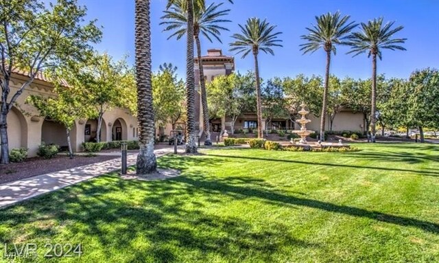 9812 Folsom Dr, Las Vegas, NV 89134 - surrounding community featuring a lawn