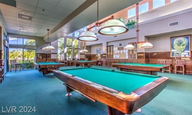 9812 Folsom Dr, Las Vegas, NV 89134 - recreation room featuring carpet, a towering ceiling, billiards table, a wainscoted wall, and a paneled ceiling
