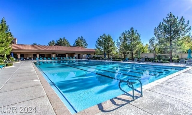 9812 Folsom Dr, Las Vegas, NV 89134 - community pool featuring a patio area