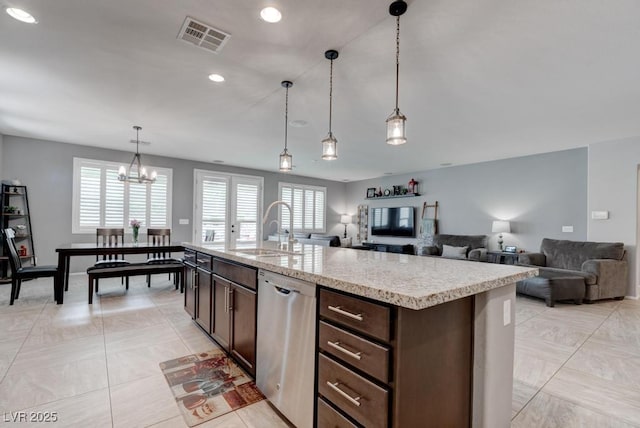 6985 Hopi Summit Ct, Las Vegas, NV 89149 - kitchen with stainless steel dishwasher, a sink, dark brown cabinets, a chandelier, and recessed lighting