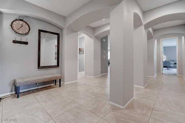 6985 Hopi Summit Ct, Las Vegas, NV 89149 - hall with arched walkways and baseboards