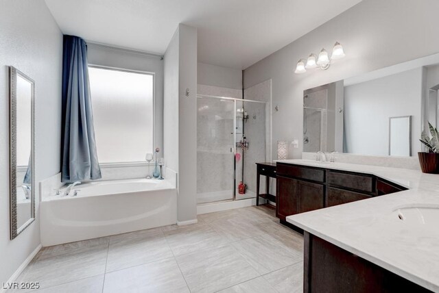 6985 Hopi Summit Ct, Las Vegas, NV 89149 - full bath with vanity, a shower stall, and a garden tub