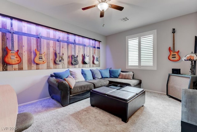 6985 Hopi Summit Ct, Las Vegas, NV 89149 - carpeted living room with ceiling fan and baseboards