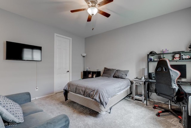 6985 Hopi Summit Ct, Las Vegas, NV 89149 - carpeted bedroom with a desk, ceiling fan, and baseboards