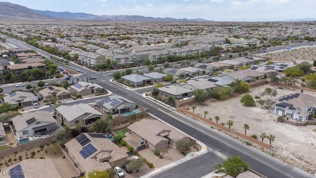 6985 Hopi Summit Ct, Las Vegas, NV 89149 - aerial overview of property's location with nearby suburban area and mountains