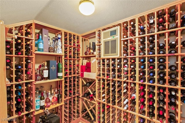 10301 Orkiney Dr, Las Vegas, NV 89144 - wine room featuring lofted ceiling and a textured ceiling