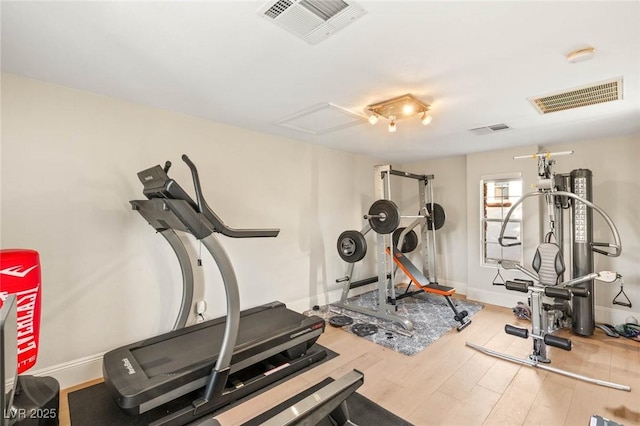 10301 Orkiney Dr, Las Vegas, NV 89144 - exercise room featuring wood finished floors and baseboards