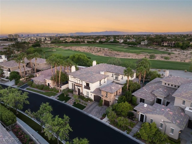 10301 Orkiney Dr, Las Vegas, NV 89144 - aerial view of residential area featuring a local golf course and a mountain backdrop