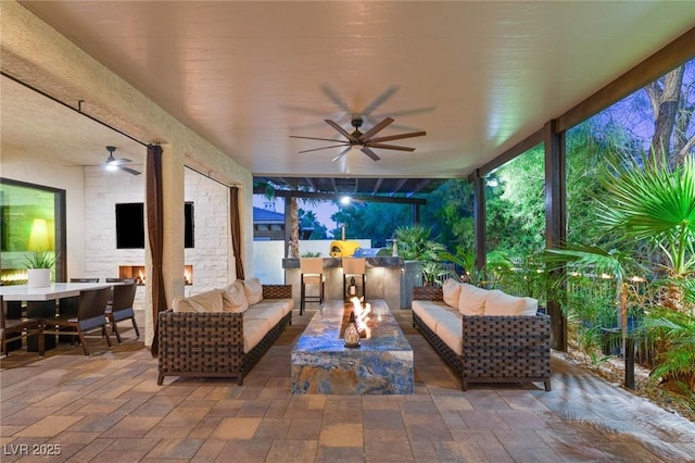10301 Orkiney Dr, Las Vegas, NV 89144 - view of patio / terrace with outdoor lounge area, a ceiling fan, outdoor dining space, and an outdoor bar