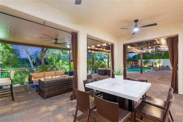10301 Orkiney Dr, Las Vegas, NV 89144 - view of patio with ceiling fan, outdoor lounge area, and outdoor dining area
