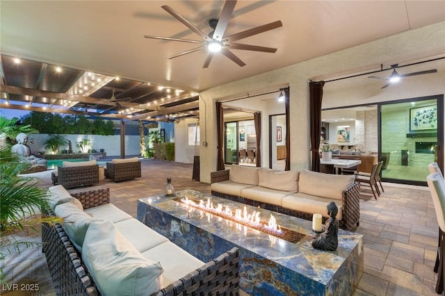 10301 Orkiney Dr, Las Vegas, NV 89144 - view of patio / terrace featuring an outdoor living space with a fire pit and a ceiling fan