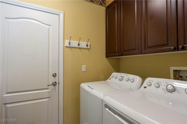 7206 Laramie Ave, Las Vegas, NV 89113 - laundry room featuring washing machine and dryer and cabinet space