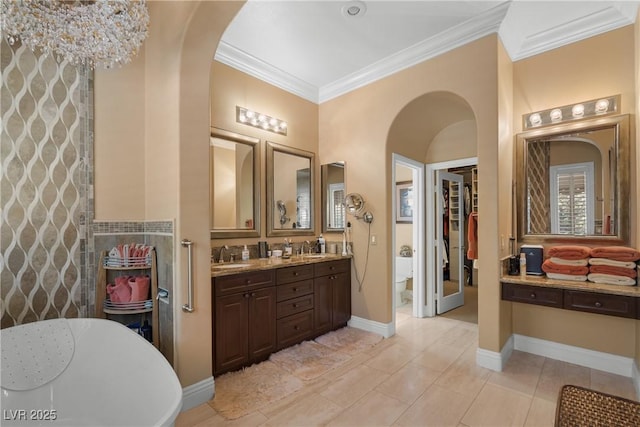 7206 Laramie Ave, Las Vegas, NV 89113 - full bath featuring double vanity, crown molding, and baseboards