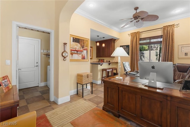 7206 Laramie Ave, Las Vegas, NV 89113 - home office featuring ornamental molding, a ceiling fan, arched walkways, and baseboards