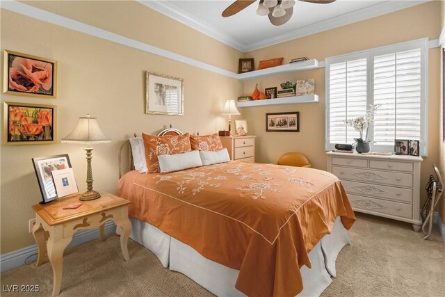 7206 Laramie Ave, Las Vegas, NV 89113 - bedroom featuring carpet, ornamental molding, a ceiling fan, and baseboards