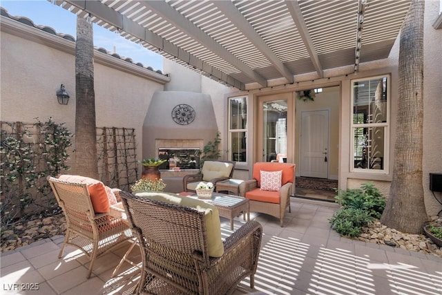 7206 Laramie Ave, Las Vegas, NV 89113 - view of patio / terrace with a glass covered fireplace and a pergola