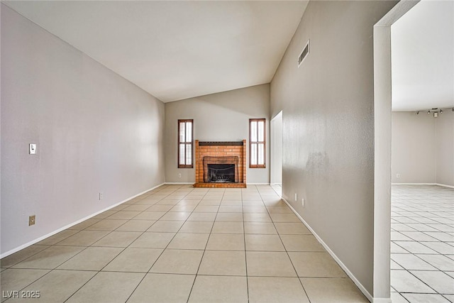 3596 Bronco Rd, Las Vegas, NV 89103 - unfurnished living room featuring light tile patterned floors, a brick fireplace, high vaulted ceiling, and baseboards