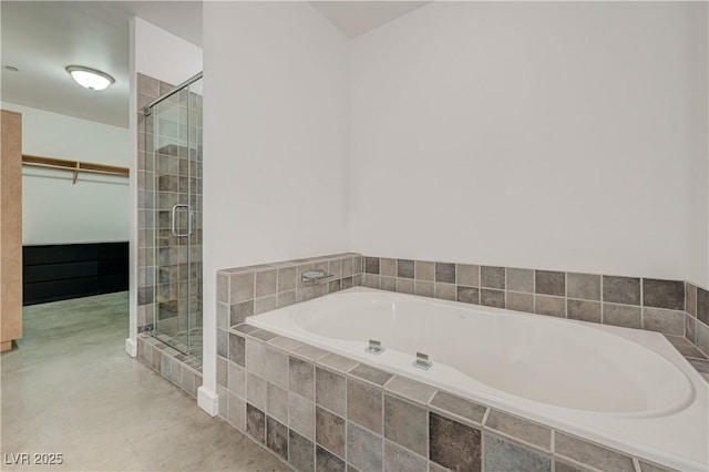 200 Hoover Ave Unit 1905, Las Vegas, NV 89101 - bathroom featuring a stall shower, a walk in closet, and a garden tub