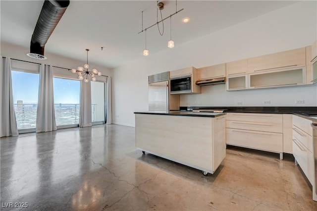 200 Hoover Ave Unit 1905, Las Vegas, NV 89101 - kitchen featuring built in appliances, under cabinet range hood, concrete floors, dark countertops, and a chandelier