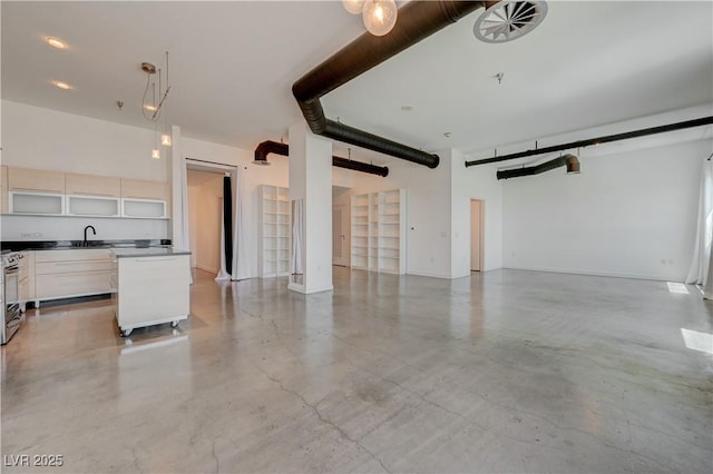 200 Hoover Ave Unit 1905, Las Vegas, NV 89101 - unfurnished living room featuring finished concrete flooring and a sink