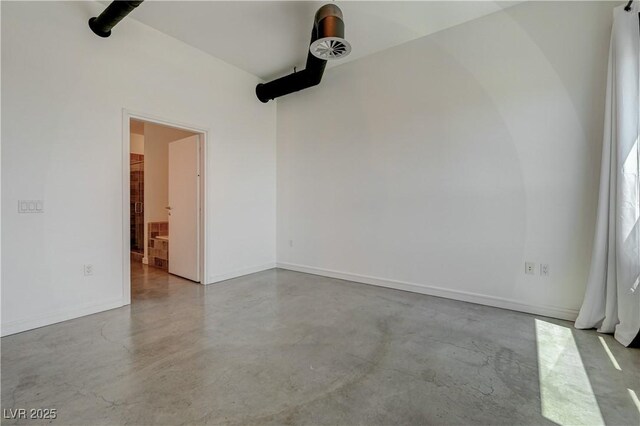 200 Hoover Ave Unit 1905, Las Vegas, NV 89101 - empty room featuring finished concrete floors and baseboards