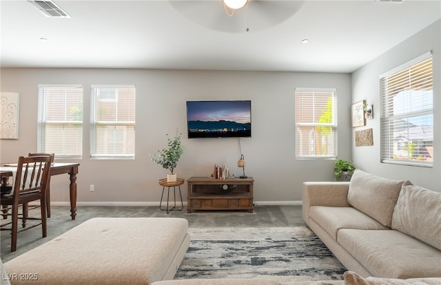 3221 Pergusa Dr, Henderson, NV 89044 - carpeted living room with ceiling fan and baseboards