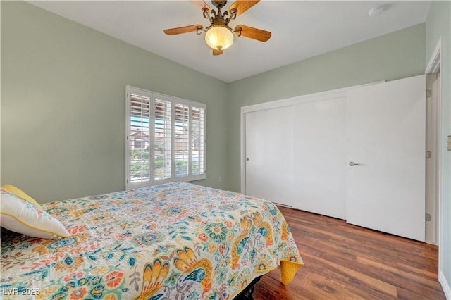 2805 Hanging Rock Dr, Las Vegas, NV 89134 - bedroom featuring wood finished floors, a closet, and a ceiling fan