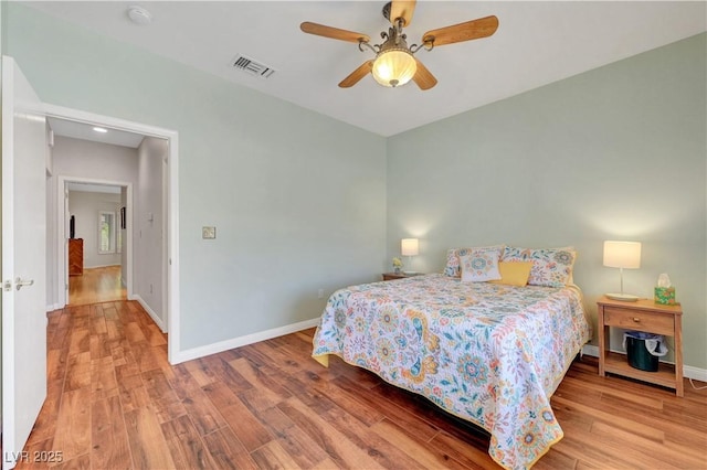 2805 Hanging Rock Dr, Las Vegas, NV 89134 - bedroom with wood finished floors, baseboards, and a ceiling fan