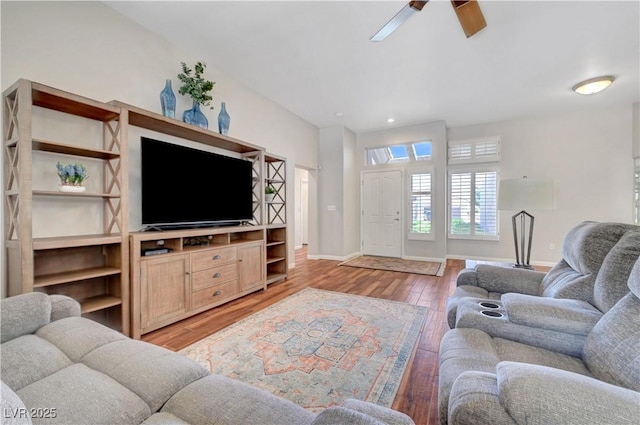 2805 Hanging Rock Dr, Las Vegas, NV 89134 - living area with light wood finished floors, a ceiling fan, and baseboards