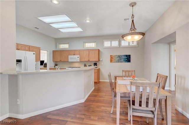 2805 Hanging Rock Dr, Las Vegas, NV 89134 - dining area with wood finished floors, baseboards, and recessed lighting