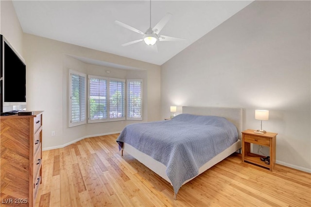 2805 Hanging Rock Dr, Las Vegas, NV 89134 - bedroom featuring light wood-style floors, baseboards, lofted ceiling, and ceiling fan