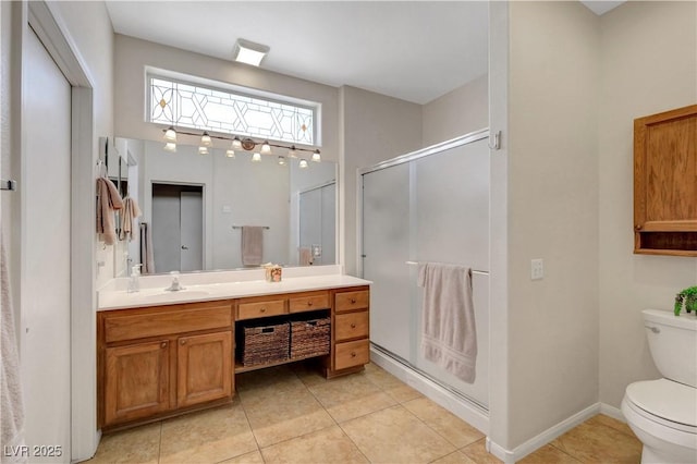 2805 Hanging Rock Dr, Las Vegas, NV 89134 - full bathroom featuring toilet, a stall shower, vanity, and tile patterned floors