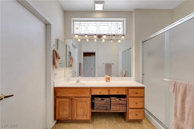 2805 Hanging Rock Dr, Las Vegas, NV 89134 - bathroom featuring vanity, tile patterned flooring, and a shower with door