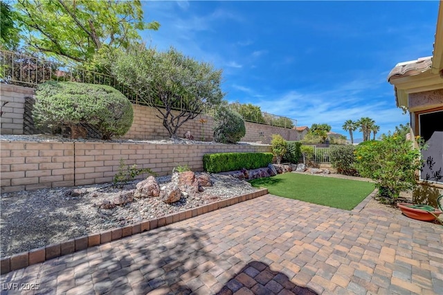 2805 Hanging Rock Dr, Las Vegas, NV 89134 - fenced backyard featuring a patio area
