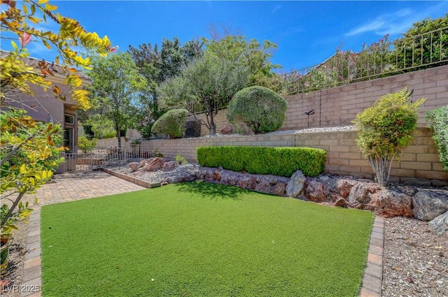 2805 Hanging Rock Dr, Las Vegas, NV 89134 - fenced backyard featuring a patio area