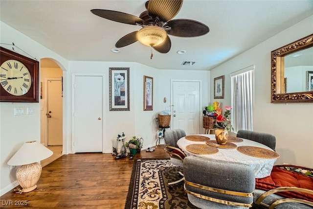 4832 Englewood Ave, Las Vegas, NV 89139 - dining area featuring arched walkways, wood finished floors, ceiling fan, baseboards, and recessed lighting